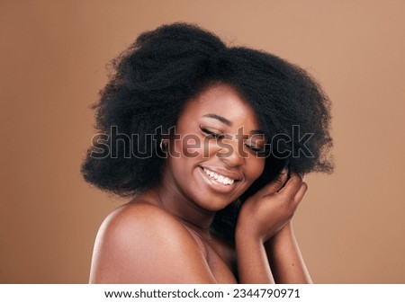 Natural, black woman and hair care with beauty, smile and luxury on a brown studio background. Afro, hairstyle and African model with mockup space, aesthetic and shine with salon treatment and growth Royalty-Free Stock Photo #2344790971