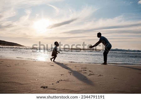 Child run into father arms, beach and family with games, love and travel, freedom and fun together outdoor. Happy people, freedom and adventure, man and girl bond with tropical holiday and silhouette