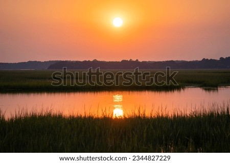 Sunset over the South Carolina River Royalty-Free Stock Photo #2344827229