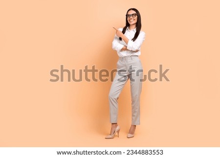 Full body portrait of classy gorgeous lawyer lady indicate finger empty space novelty isolated on beige color background