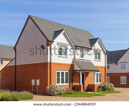 New build modern detached house. UK Royalty-Free Stock Photo #2344884059
