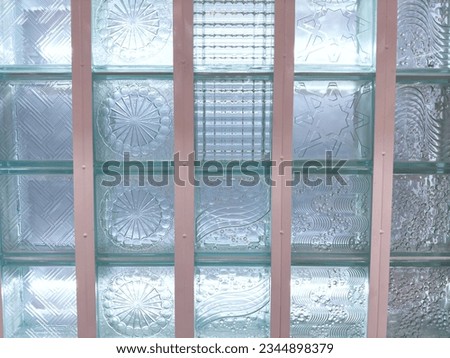Glass block wall It is a translucent material that looks like a square block. Can be installed as a wall Used as a light channel in various areas. Royalty-Free Stock Photo #2344898379