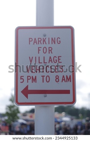 Parking sign for local village vehicles at Event
