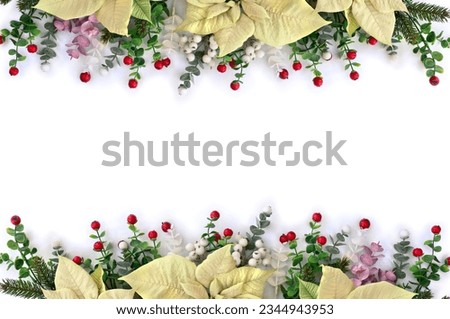 Christmas decoration. Frame of flowers of white poinsettia, branch christmas tree, berries mistletoe, red berry on a white background with space for text. Top view, flat lay Royalty-Free Stock Photo #2344943953