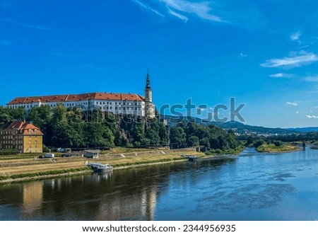 Medieval castle built on a high rock on the right bank of the river Elbe. Castle in a small town in the north of the Czech Republic