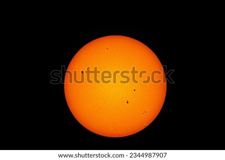sunspots are phenomena on the Sun's photosphere that appear as temporary spots that are darker than the surrounding areas. solar photography, astrophotography. august 2023