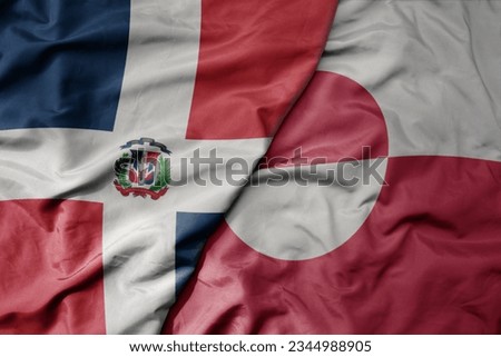 big waving realistic national colorful flag of cuba and national flag of greenland . macro