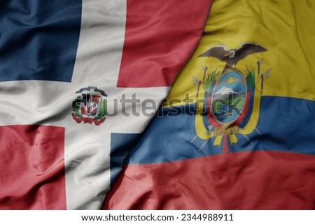 big waving realistic national colorful flag of dominican republic and national flag of ecuador . macro