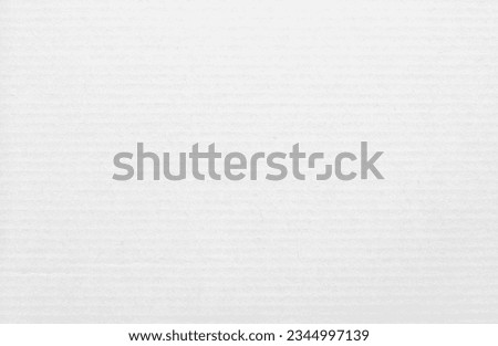 White cardboard sheet texture background, detail of recycle paper box pattern. Royalty-Free Stock Photo #2344997139