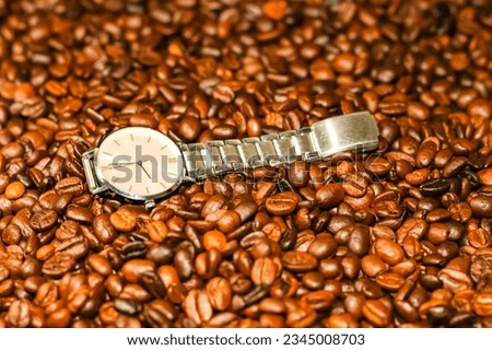 Put clock on the coffee beans patterns picture for coffee beans background.