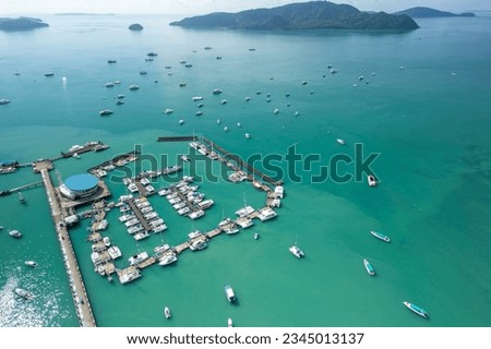 Aerial View Drone shot of Yacht and sailboat parking in marina, Transportation and travel background, Beautiful sea in summer season