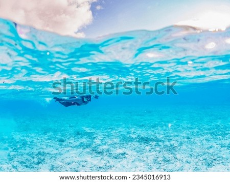 Beautiful Half Water Surface Photo with Diver, Ama Beach, ZAMAMI Island,
