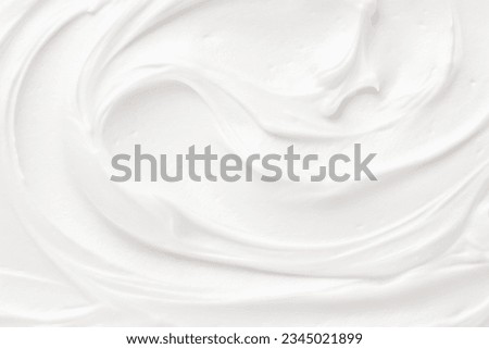 Pure white cream skin care texture smooth creamy cosmetic product background,luxurious delight of skincare with a delicate cream texture Royalty-Free Stock Photo #2345021899
