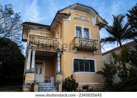 Facade of old and abandoned residential house on the city in Brazil Royalty-Free Stock Photo #2345035645