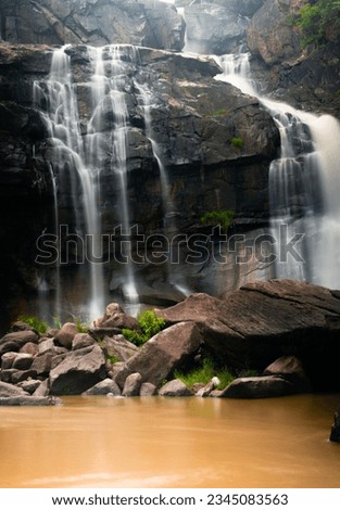 Silky milky smooth waterfall flowing over rocks at Hundru Ranchi Jharkhand India