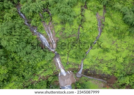 Aerial footage of a monsoon season waterfall near Pune India. Monsoon is the annual rainy season in India from June to September. Royalty-Free Stock Photo #2345087999