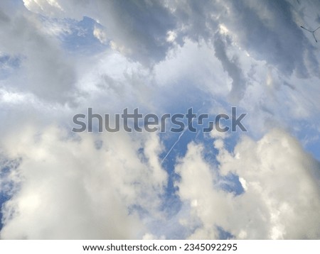 The background of the blue sky, white clouds, naturally occurring colors. There is a space for entering text. White background with images, products or products, banners, blue-white background, convey
