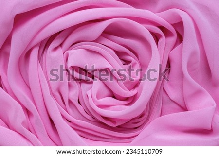 circular pink cloth, pink cloth background, spiral swirl cloth, twisted background