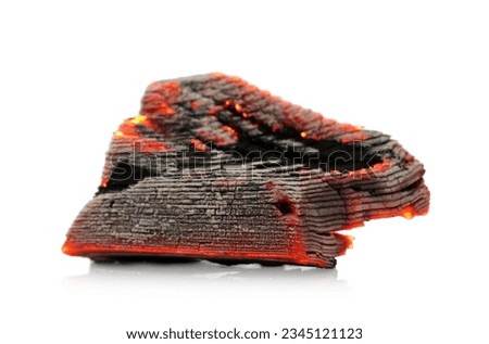 Piece of smoldering coal on white background Royalty-Free Stock Photo #2345121123