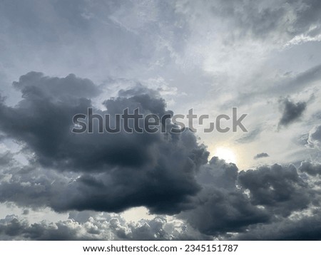 When the weather is bad, the big gray Nimbostratus clouds and it's about to heavy rain at Bangkok, Thailand.  Royalty-Free Stock Photo #2345151787
