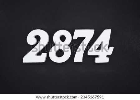 Black for the background. The number 2874 is made of white painted wood.