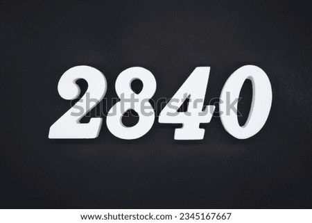 Black for the background. The number 2840 is made of white painted wood.