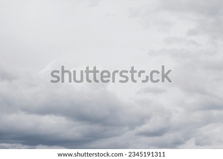 A gray sky with clouds