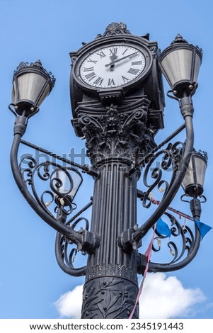 Ornate Victorian street clock on the Great Whyte, Ramsey, Cambridgeshire, England. Royalty-Free Stock Photo #2345191443
