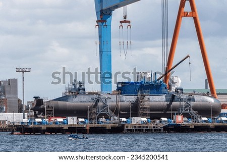Kiel, harbor impressions, the most modern conventional submarine currently built at the TKMS shipyard for the Israeli Navy, the Dragon, shortly before completion on the outfitting quay Royalty-Free Stock Photo #2345200541