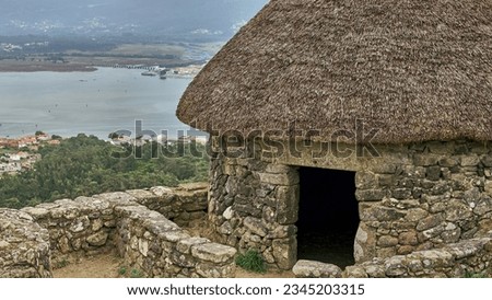 The ancient Castro de Santa Tecla on the slopes of Mount Santa Tecla. This historic site graces the southwestern tip of Galicia withIts elevated position offers  views of the pictures Miño River