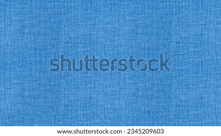 Seamless plain blue colored linen background