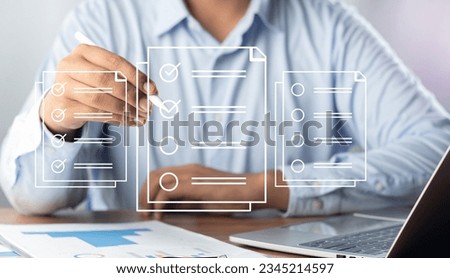 Digital Checklists for efficient business management, Businessman touching marking on checklist guide to paperless assessment and Future Success, Streamlining operations with online surveys. Royalty-Free Stock Photo #2345214597
