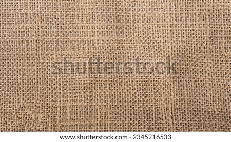 Top view of sackcloth fabric for background, brown sackcloth pattern background. Close-up of brown sackcloth texture for background. Royalty-Free Stock Photo #2345216533