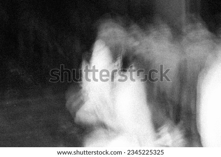 Artistic, abstract, and blury slow shutter photo of a dance performance. This photo is suitable for wallpaper, backgrounds, references, and photo manipulation materials.