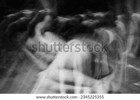 Artistic, abstract, and blury slow shutter photo of a dance performance. This photo is suitable for wallpaper, backgrounds, references, and photo manipulation materials.