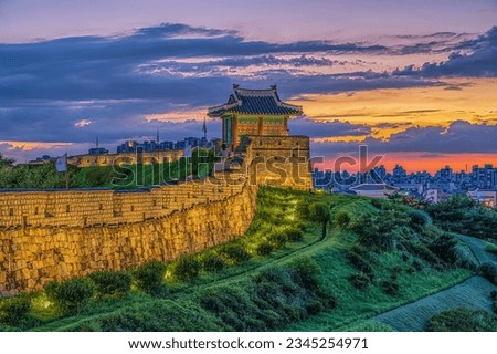 Landmark during sunset. Landscape of
Hwaseong Fortress is a UNESCO World Heritage Site. Summer of Suwon Hwaseong Fortress in Suwon, Gyeonggi-do, Korea Royalty-Free Stock Photo #2345254971