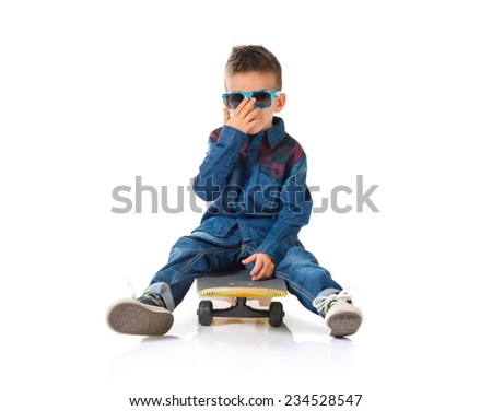 Kid playing with skate board