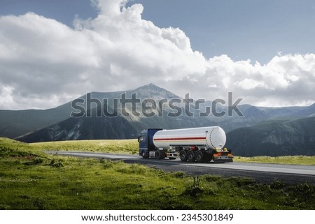 fuel tanker truck on th mountain road Royalty-Free Stock Photo #2345301849