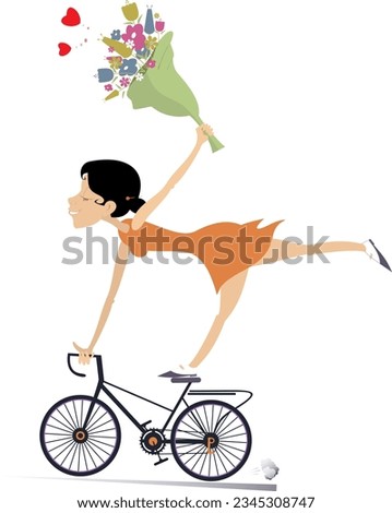 Cycling young woman. Bicycle  and bunch of flowers. Happy young woman rides a bicycle and holds a bunch of flowers