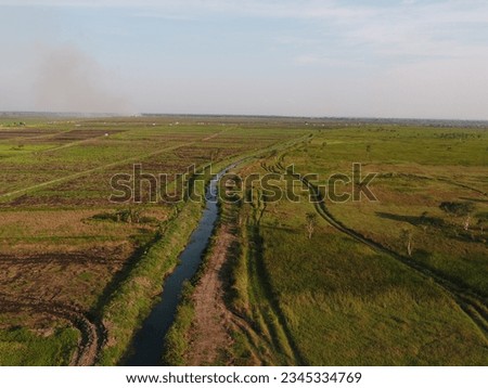 A paddy field, also known as a rice paddy or rice field, is a flooded parcel of land where rice is cultivated. This agricultural landscape is a fundamental feature of rice-growing regions like asia.