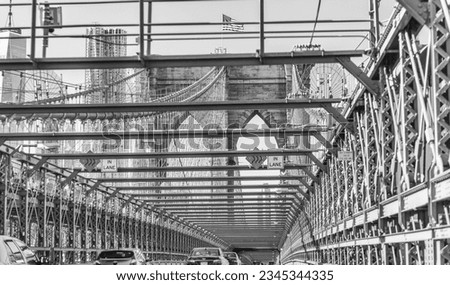Brooklyn Bridge as seen from moving car, New York City - USA.