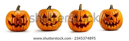Halloween Jack o Lantern Pumpkins with a spooky faces. Isolated on a white background Royalty-Free Stock Photo #2345374895