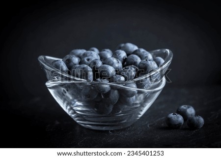 Blueberry antioxidant organic in a bowl. Small depth of field.