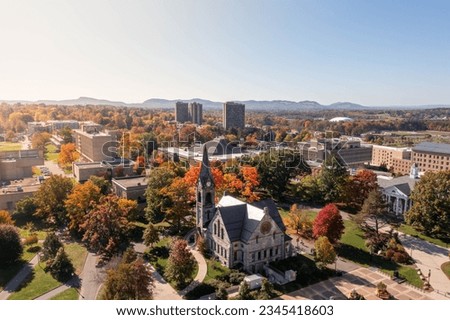 An aerial shot of the University of Massachusetts Amherst campus on a sunny autumn day Royalty-Free Stock Photo #2345418603