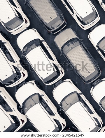 unmarked vehicles all bunched together Royalty-Free Stock Photo #2345421549