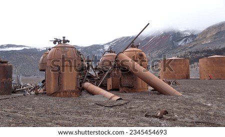 Old rusted tanks and boilers at a whaling station at Whaler's Bay, Deception Island, Antarctica Royalty-Free Stock Photo #2345454693