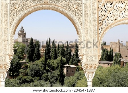 Arches in Islamic (Moorish)  style and  Alhambra, Granada, Spain