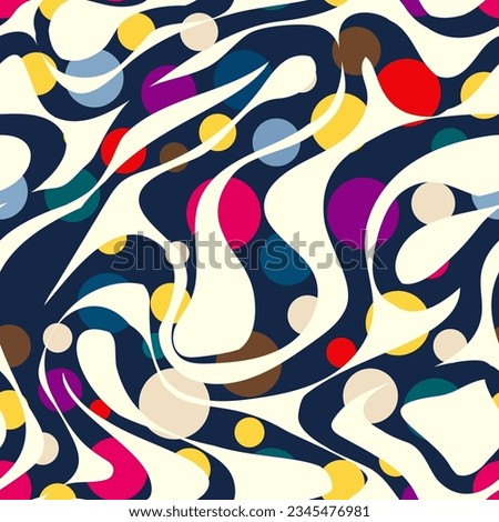 Abstract seamless pattern consisting of wavy linesl and arge small circles of different sizes in different trendy colors on grey background.