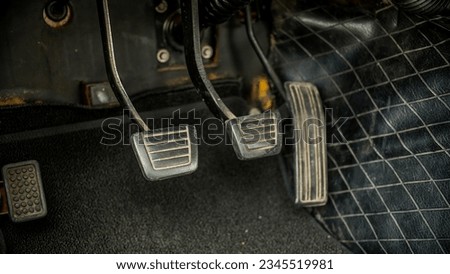 Pedals inside a vintage car Royalty-Free Stock Photo #2345519981