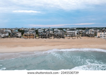 Aerial View of Beach Homes in Avon North Carolina that are right at the Oceanfront Seen from the Atlantic Ocean Royalty-Free Stock Photo #2345530739